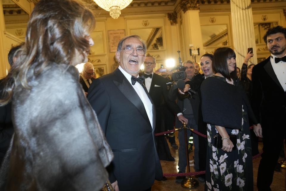 Italian Senate President Ignazio La Russa arrives to attend La Scala opera house's gala season opener, Giuseppe Verdi's opera 'Don Carlo' at the Milan La Scala theater, Italy, Thursday Dec. 7, 2023. The season-opener Thursday, held each year on the Milan feast day St. Ambrose, is considered one of the highlights of the European cultural calendar. (AP Photo/Luca Bruno)