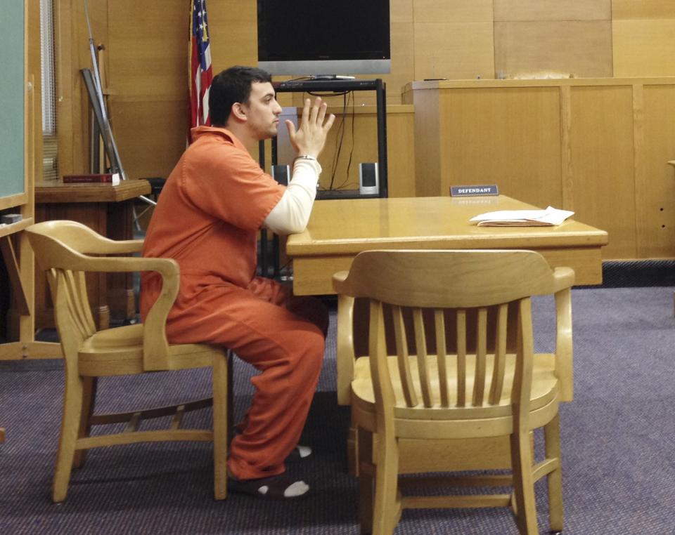 Matthew Belardine, 27, a former volunteer football coach convicted of lying to authorities in connection with an Ohio high school rape case, is shown at a hearing in Steubenville, Ohio, December 17, 2014. Belardine was sentenced on December 22, 2014 to 60 days in prison for violating terms of his probation. Picture taken on December 17, 2014. REUTERS/Elizabeth Daley (UNITED STATES - Tags: CRIME EDUCATION SPORT)