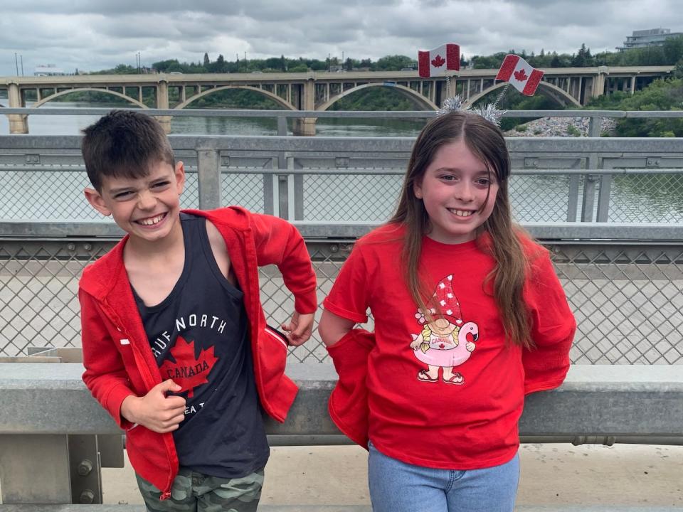 Kids in Canada gear hanging out by the food trucks on the Traffic Bridge in Saskatoon on July 1.