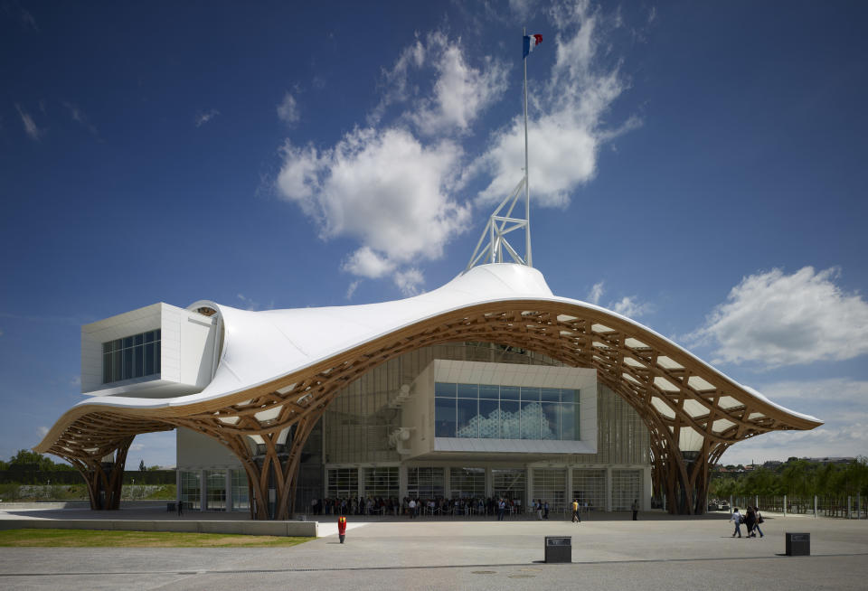 This undated image released by the Pritzker Prize shows the exterior of the Centre Pompidou-Metz, a contemporary art museum in Metz, France, designed by designed by Tokyo-born architect Shigeru Ban, 56, the recipient of the 2014 Pritzker Architecture Prize. (AP Photo/Pritzker Prize, Didier Boy de la Tour)