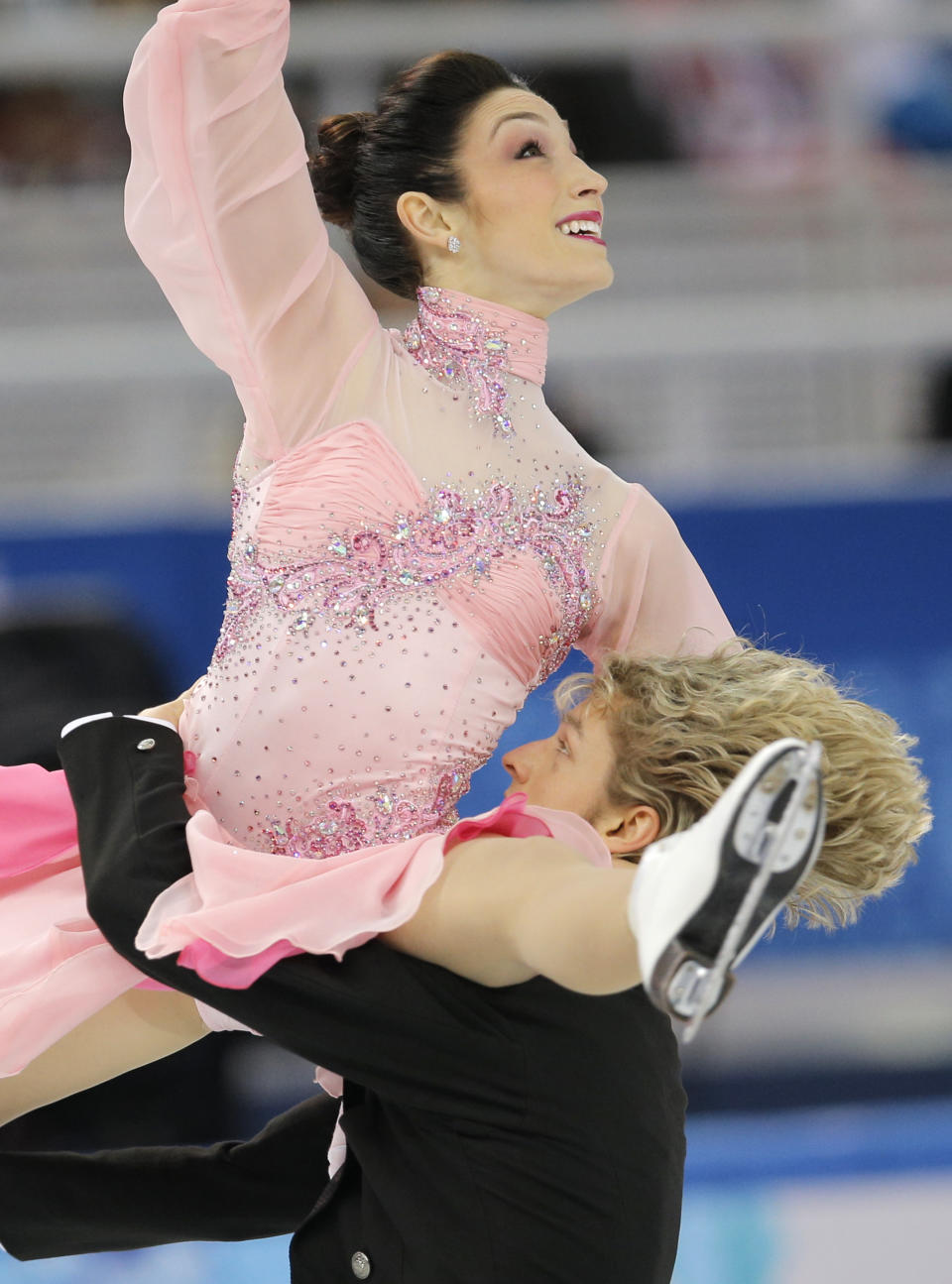 Meryl Davis and Charlie White of the United States compete in the team ice dance short dance figure skating competition at the Iceberg Skating Palace during the 2014 Winter Olympics, Saturday, Feb. 8, 2014, in Sochi, Russia. (AP Photo/Vadim Ghirda)