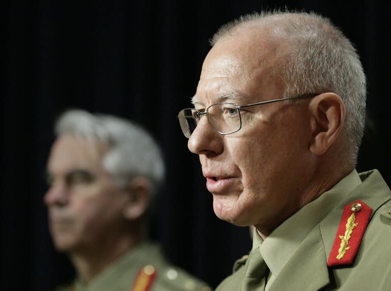 This file photo shows General David Hurley (R) briefing the media in Canberra, on June 8, 2010. Australia and China are planning joint military exercises which may also include the United States as the nations work to ensure stability in the region, Hurley said in an interview with an Australian paper, published on Wednesday