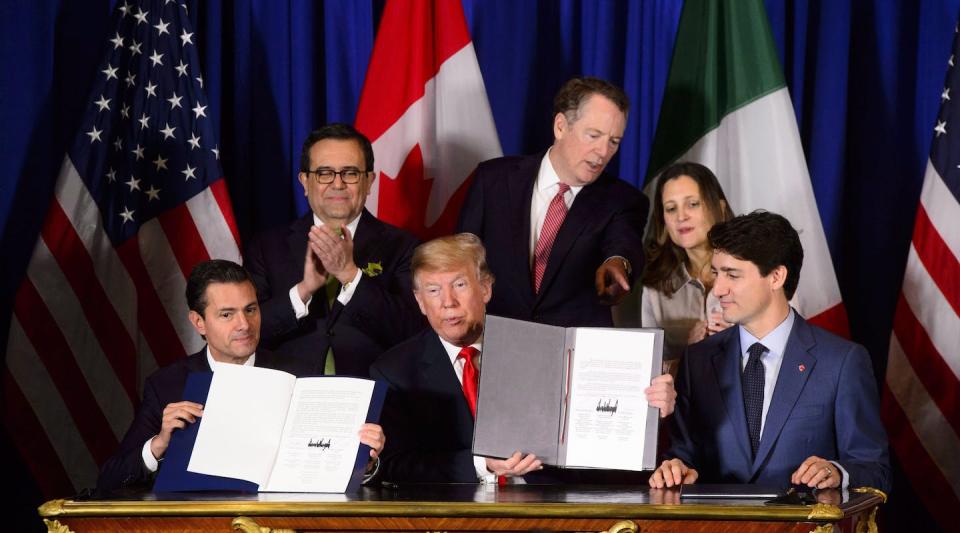 Canadian Prime Minister Justin Trudeau at a signing ceremony for the CUSMA agreement with the then-presidents of the U.S. and Mexico in Buenos Aires, Argentina in November 2018. THE CANADIAN PRESS/Sean Kilpatrick