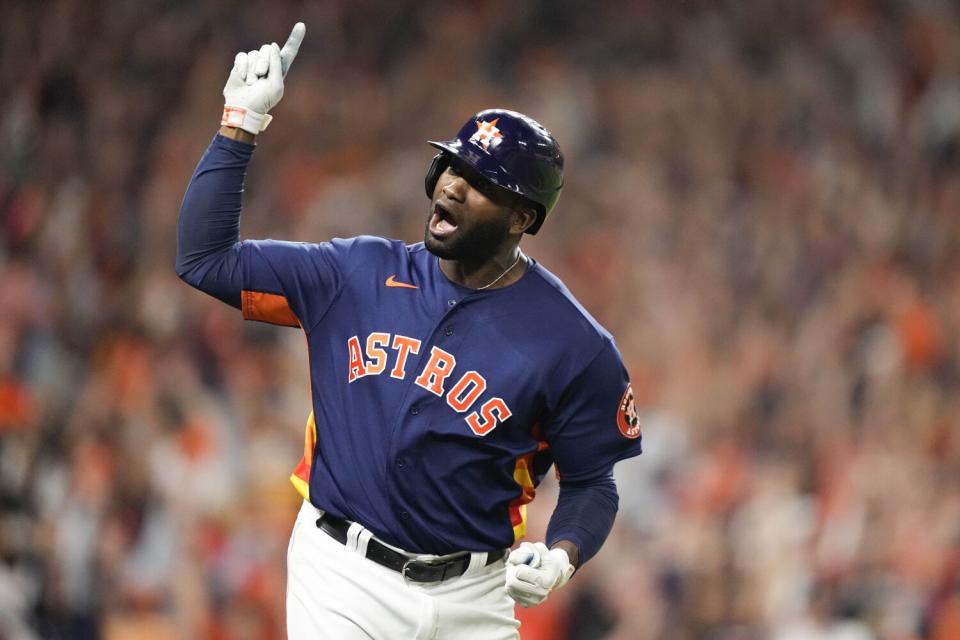 Houston's Yordan Álvarez celebrates after hitting a three-run home run in the sixth inning Saturday.