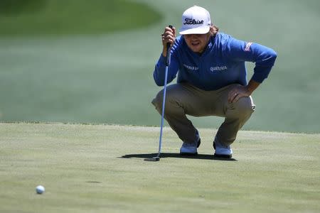 May 7, 2017; Wilmington, NC, USA; Zac Blair looks over his line to the cup on three during the final round of the Wells Fargo Championship golf tournament at Eagle Point Golf Club. Mandatory Credit: Jim Dedmon-USA TODAY Sports