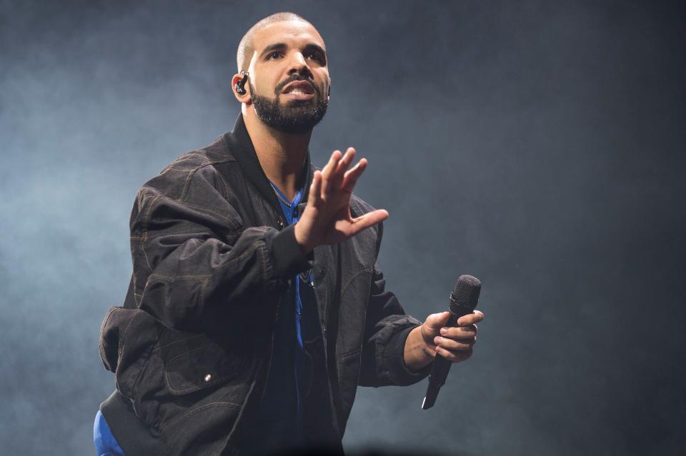 FILE - In this Oct. 8, 2016 file photo, Drake performs onstage in Toronto. The rapper has been named Spotify’s most-streamed artist of the decade. (Photo by Arthur Mola/Invision/AP, File) ORG XMIT: NYET206