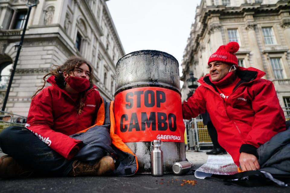 Campaigners from Greenpeace outside Downing Street, London, during a protest in October against the Cambo oil field off the west coast of Shetland (Victoria Jones/PA) (PA Wire)