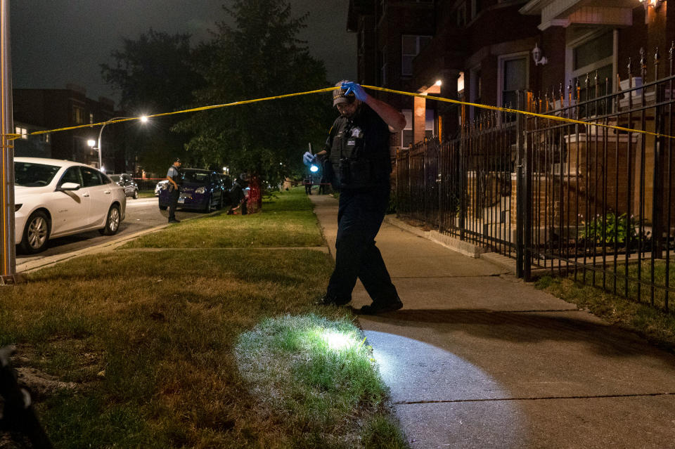 Chicago police at the scene of a shooting in the Woodlawn neighborhood of Chicago, Friday, Sept. 3, 2021. A 4-year-old boy was shot twice when bullets came through the front window of a home, Chicago Police said.<span class="copyright">Tyler LaRiviere—Chicago Sun-Times/AP</span>