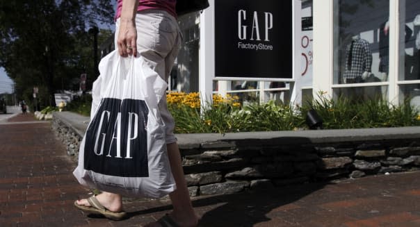 In this Wednesday, Aug. 17, 2011, file photo, a shopper leaves the Gap store in Freeport, Maine. Clothing retailer Gap Inc. said Thursday, Aug. 2, 2012,  that July sales at stores open at least a year jumped 10 percent, easily surpassing analysts' expectations, and said second-quarter earnings would rise from last year's results.   (AP Photo/Pat Wellenbach)