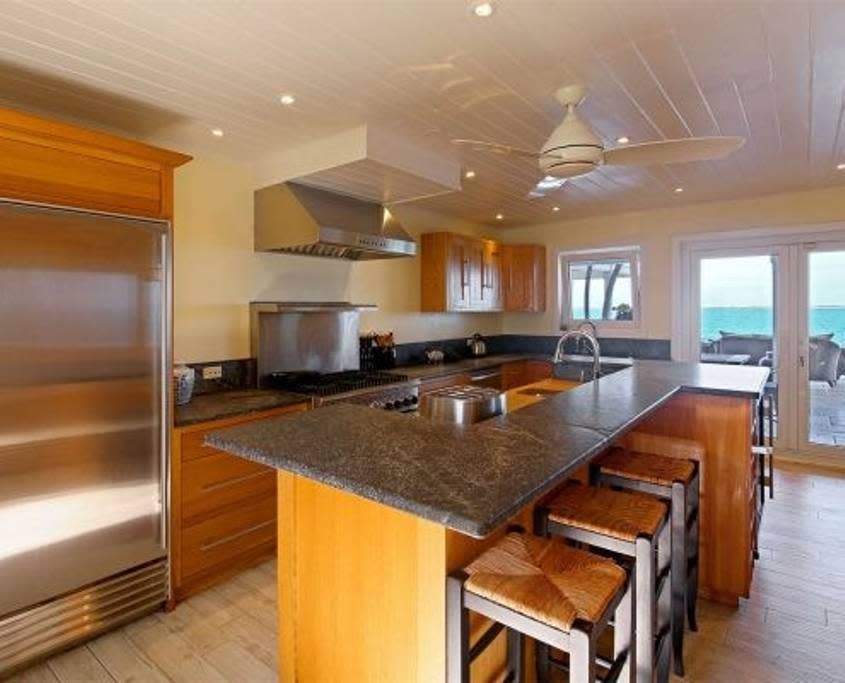 <p>The modern, well-appointed kitchen has a wine fridge. <br>(Airbnb) </p>