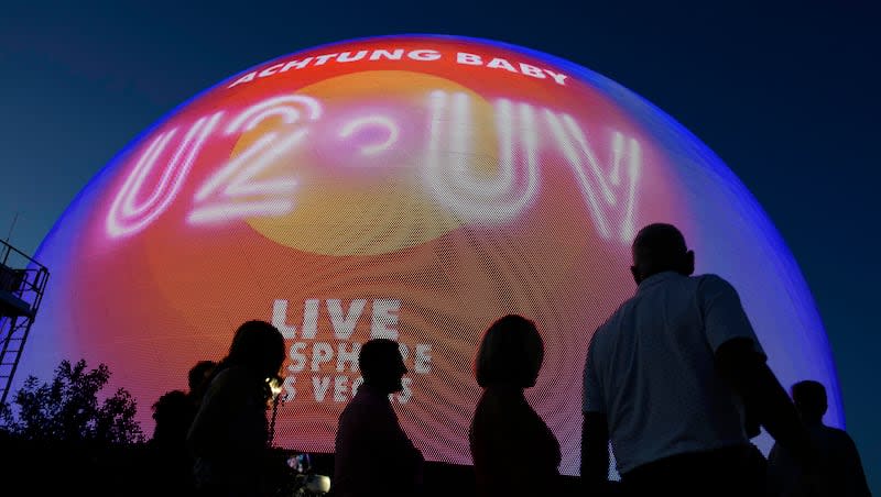 People arrive for the opening night of the Sphere and U2'S “UV Achtung Baby" show, Friday, Sept. 29, 2023, in Las Vegas.