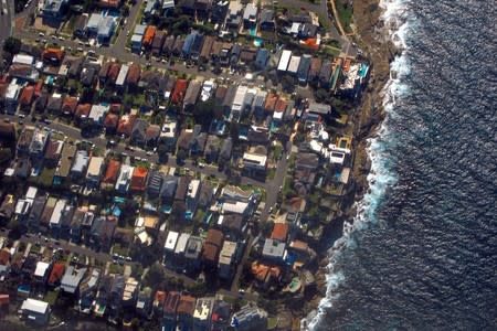 FILE PHOTO: Houses located in the Sydney suburb of Coogee can be seen along the coastline in Australia