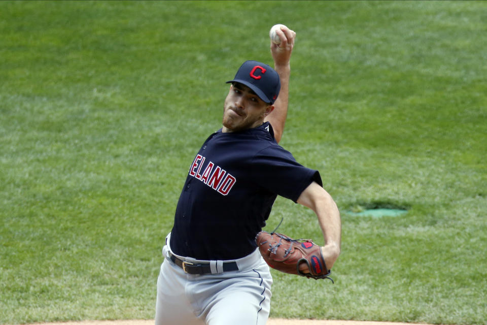 Cleveland Indians pitcher Aaron Civale throws against the Minnesota Twins in the first inning of a baseball game Sunday, Aug. 2, 2020, in Minneapolis. (AP Photo/Jim Mone)