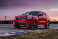 <p>The outgoing <a href="https://www.caranddriver.com/jeep/grand-cherokee-2021" rel="nofollow noopener" target="_blank" data-ylk="slk:Jeep Grand Cherokee;elm:context_link;itc:0;sec:content-canvas" class="link ">Jeep Grand Cherokee</a> shares its platform with the Dodge Durango, which is why the 475-hp Grand Cherokee SRT and 707-hp Grand Cherokee Trackhawk were such lateral moves. <a href="https://www.caranddriver.com/jeep/grand-cherokee-trackhawk" rel="nofollow noopener" target="_blank" data-ylk="slk:The Trackhawk;elm:context_link;itc:0;sec:content-canvas" class="link ">The Trackhawk</a> was the greatest of Grand Cherokees, built with a stronger transmission, beefier transfer case, and using a reinforced rear driveshaft, half-shafts, CV joints, and differential. Now that there’s a <a href="https://www.caranddriver.com/jeep/grand-cherokee" rel="nofollow noopener" target="_blank" data-ylk="slk:new-generation Grand Cherokee;elm:context_link;itc:0;sec:content-canvas" class="link ">new-generation Grand Cherokee</a>, the SRT and Trackhawk models are waved off. Nothing has been confirmed yet, but knowing Jeep, an electrified version of the new Grand Cherokee with loads of horsepower and torque will rear its beautiful head in the coming years. </p>