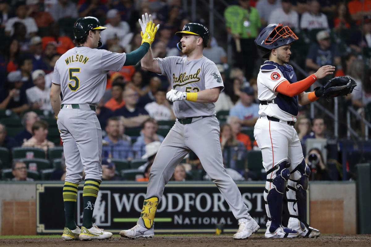 Kyle McCann homers, Brent Rooker drives in 2 as Athletics beat Astros 5-4