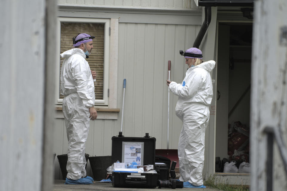 Technicians from the police investigate the apartment of the man who killed five people in a bow and arrow attack, in Kongsberg, Norway, Saturday, Oct. 16, 2021. Norwegian authorities say the bow-and-arrow rampage by a man who killed five people in a small town appeared to be a terrorist act. Police identified the attacker as Espen Andersen Braathen, a 37-year-old Danish citizen, who was arrested Wednesday night. (Terje Pedersen/NTB Scanpix via AP)