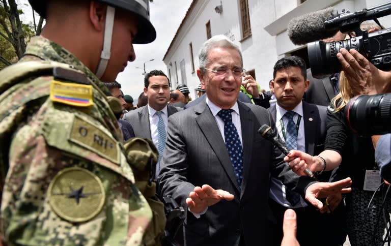 Colombian former president and current senator Alvaro Uribe arrives at Narino Palace in Bogota for a meeting with Colombian President Juan Manuel Santos on October 5, 2016