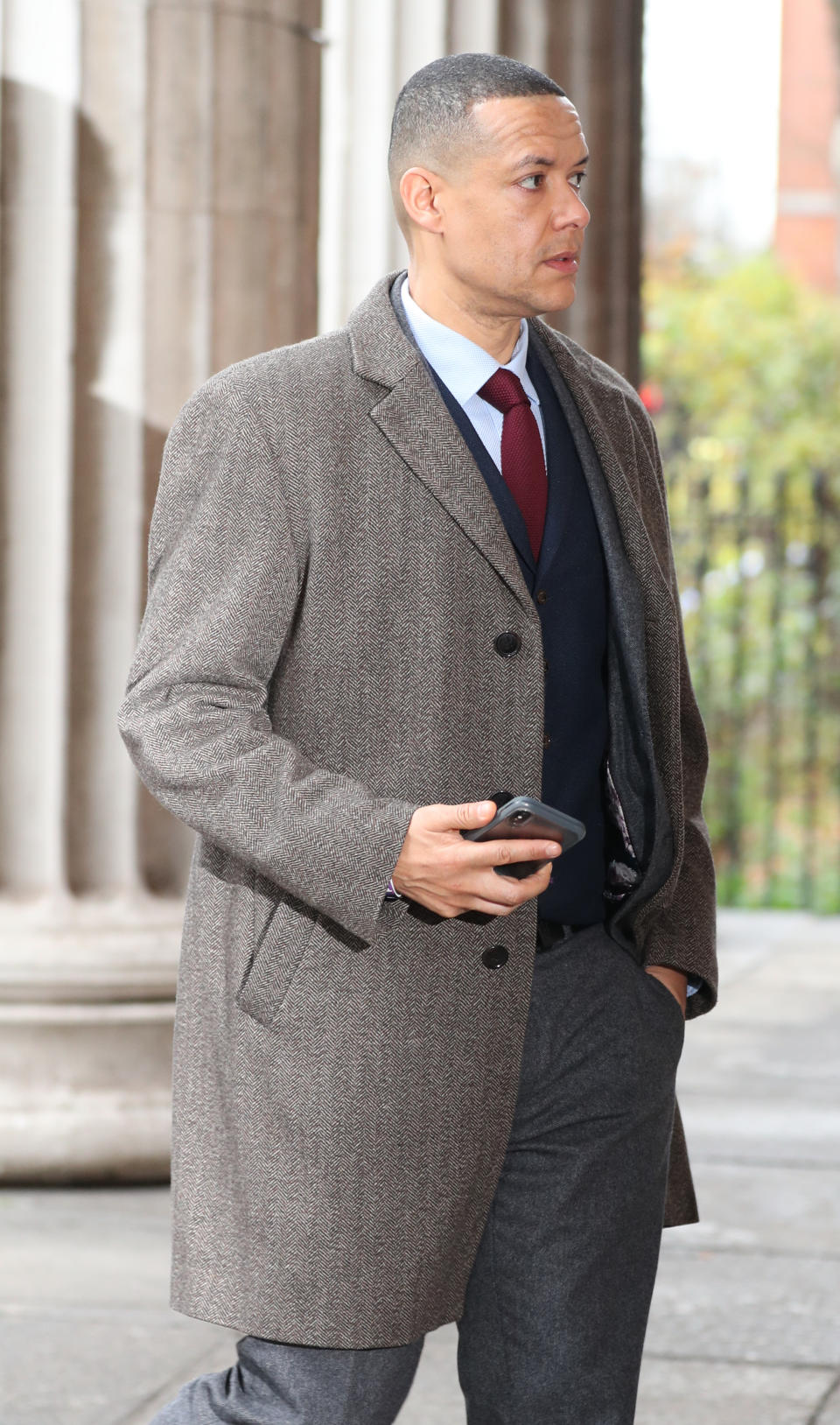 Clive Lewis arrives for the funeral of Frank Dobson at St Pancras Church in London.