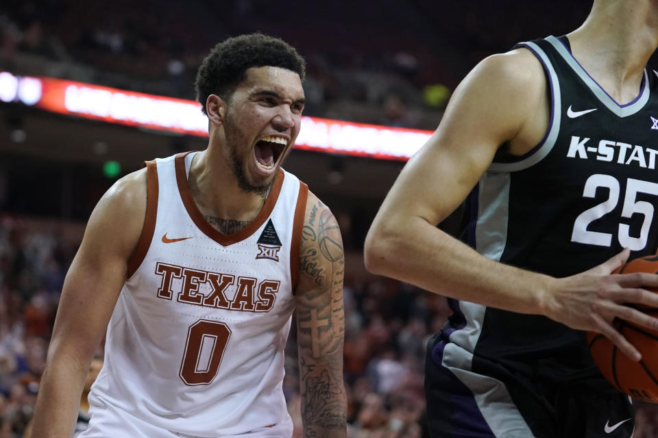 Texas forward Timmy Allen (0) celebrates a score against Kansas State during the second half of an NCAA college basketball game Tuesday, Jan. 18, 2022, in Austin, Texas. (AP Photo/Eric Gay)