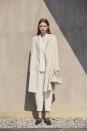 <p>Fabiana Filippi turned down the volume for spring 2021, showing a collection, titled The Perfect Rhythm of Nature, that focused on uncluttered forms and effervescent hues. From an elegant Grecian-draped slip in beige and a pleated skirt-and-top combo in mauve to a sleek sky blue coat and a refined brocade dress with a sarong skirt, the Italian label proved that one need not shout to make an impact.—<em>Barry Samaha</em></p>