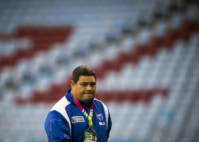 Samoa's head coach Stephen Betham takes part in the captain's run training session at Villa park stadium in Birmingham on September 25, 2015