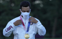 Xander Schauffele of the United States poses with his Gold in the Men's Golf event at the 2020 Summer Olympics on Sunday, Aug. 1, 2021, in Kawagoe, Japan.. (AP Photo/Andy Wong)