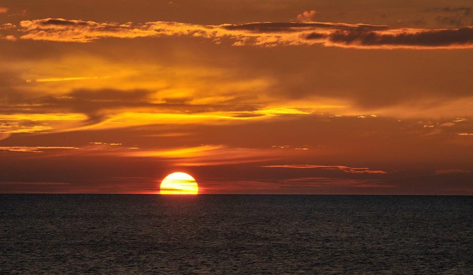 The sunset viewed from Barracks Beach at Presque Isle State Park in Millcreek Township.