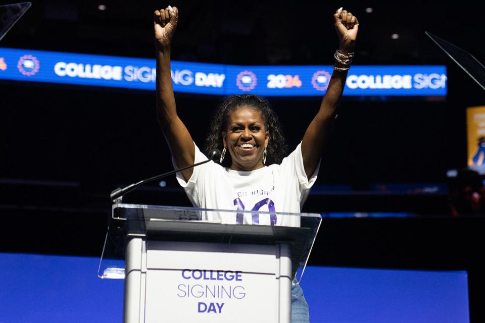 <p>Alexander Vassiliadis Photography</p> Michelle Obama visits a College Signing Day event in Washington, D.C. on April 30, 2024