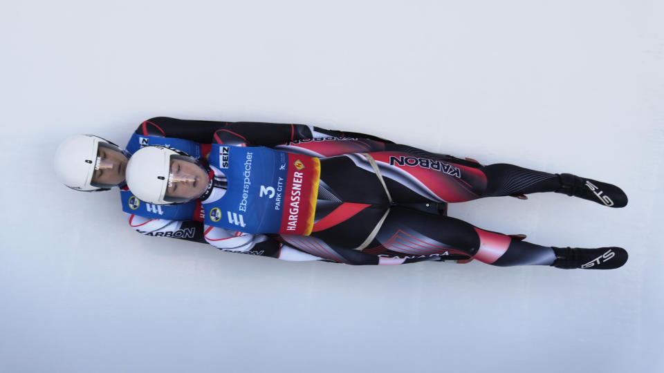 Canada's Caitlin Nash and Natalie Corless compete in the women's doubles at a World Cup luge event Friday, Dec. 16, 2022, in Park City, Utah. (AP Photo/Rick Bowmer)