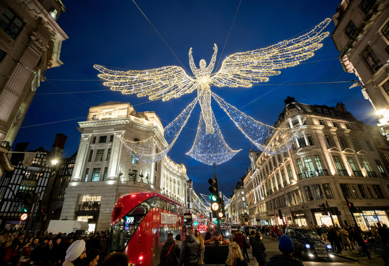 UK footfall: Shoppers make their way as Christmas lights illuminate Regent Street