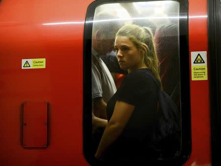 Commuters brave rush hour on the northern line on the London underground in London, Britain August 5, 2015. REUTERS/Dylan Martinez