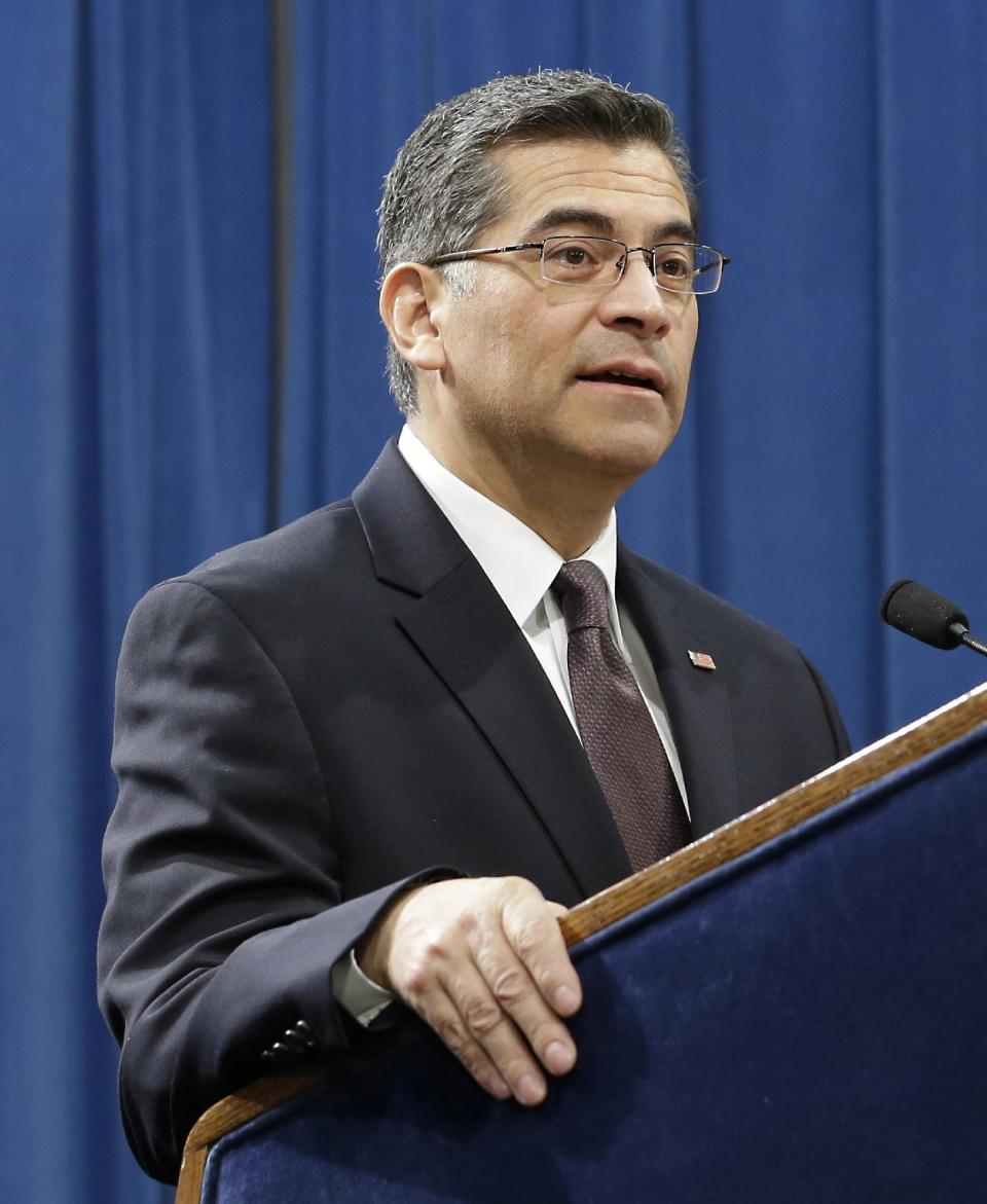 File - In this Jan. 24, 2017, file photo, Xavier Becerra, California's Attorney General, talks to reporters at a news conference in Sacramento, Calif. Democratic attorneys general from 15 states have vowed to “use all the tools of our offices” to push back against President Donald Trump’s immigration order in the clearest sign yet that the top lawyers for Democratic-leaning states plan to fight policies coming from the new administration when they believe they are unconstitutional or harmful to the public. (AP Photo/Rich Pedroncelli, File)