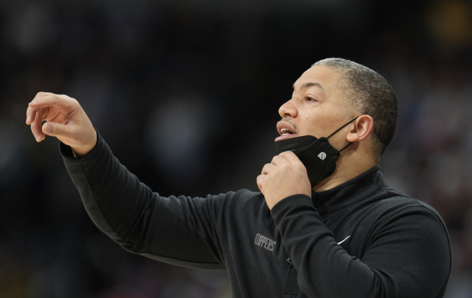 Los Angeles Clippers head coach Tyronn Lue directs his team against the Denver Nuggets in the first half of an NBA basketball game Wednesday, Jan. 19, 2022, in Denver. (AP Photo/David Zalubowski)