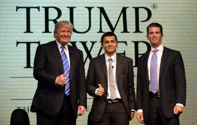 Photo taken in 2014 shows Donald Trump Sr with managing director of the Lodha group, Abhishek Lodha (C), and Donald Trump Jr. during a news conference in Mumbai