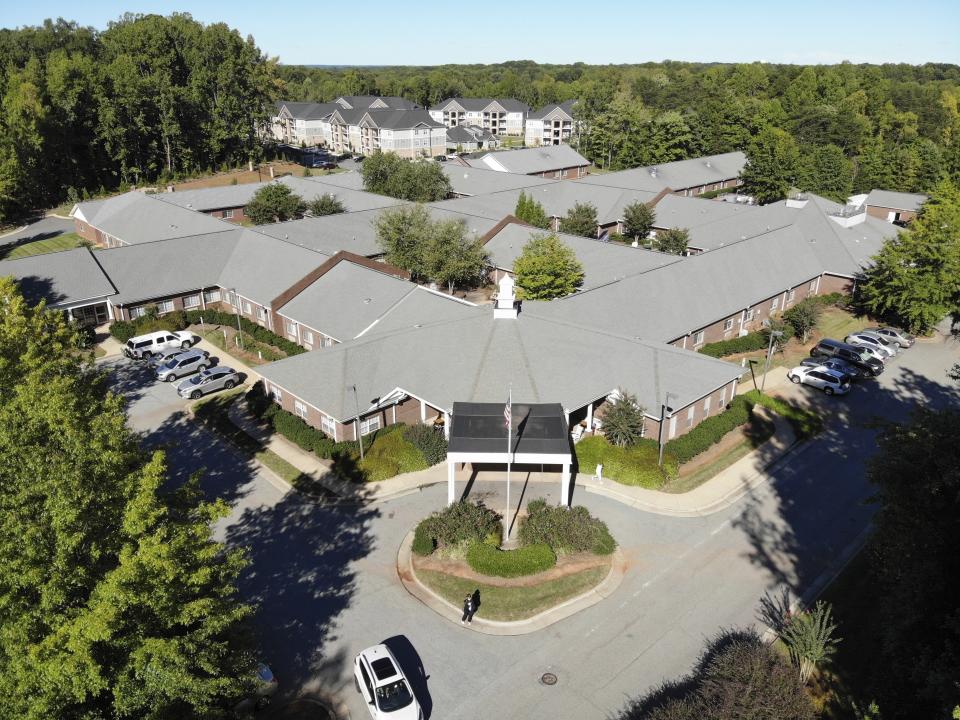 This Sept. 23, 2021 photo shows the Blumenthal Nursing and Rehabilitation Center in Greensboro, N.C. In January 2019, it had a staffing level above the benchmark used by many experts, earning four stars out of five under Medicare’s staffing ratings. But it fell about 12% in the year that followed, even more in the first year of the pandemic, and still more in the months since. By June, the facility’s staffing was down 15% from the start of 2020, and 25% from the start of 2019. (AP Photo/Allen G. Breed)