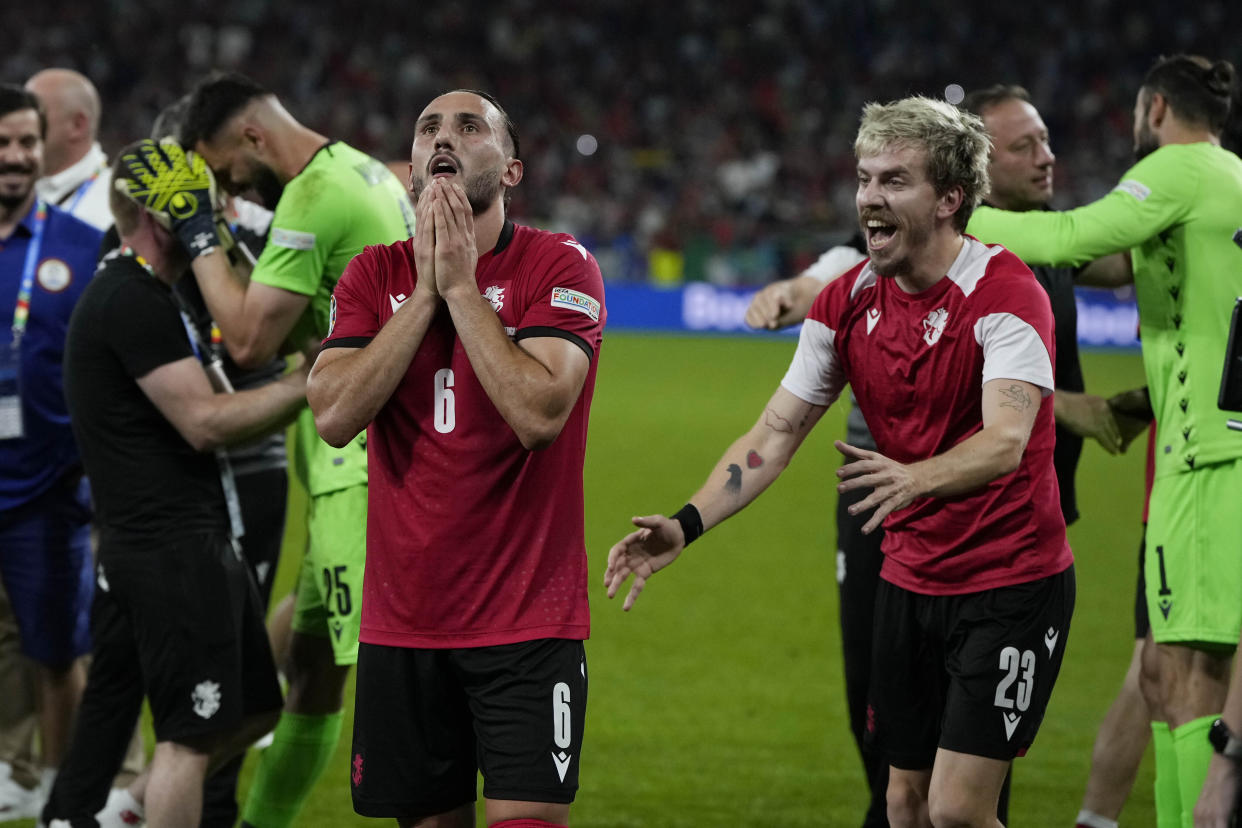 Georgia is heading to the Round of 16 in Euro 2024 after beating Portugal. (AP Photo/Alessandra Tarantino)