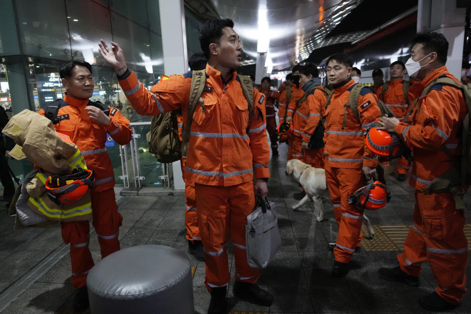 South Korean rescue team members prepare to board a plane for quake-ravaged Turkey at the Incheon International Airport in Incheon, South Korea, Tuesday, Feb. 7, 2023. (AP Photo/(AP Photo/Ahn Young-joon)