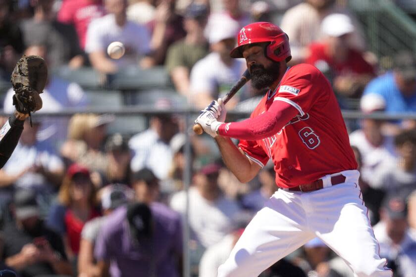 Angels' Anthony Rendon takes an inside pitch during a baseball game against the White Sox