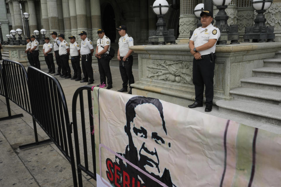 A banner with a portrait of the Attorney General Consuelo Porras hangs on a crowd control barrier during a protest against her actions against the Seed Movement party and President-Elect Bernardo Arévalo, at the Constitutional Square in Guatemala City, Saturday, Sept. 2, 2023. Guatemala's Congress has declared the Seed Movement's seven lawmakers — one of whom is Arévalo — independents, which bars them from holding leadership positions. (AP Photo/Moises Castillo)