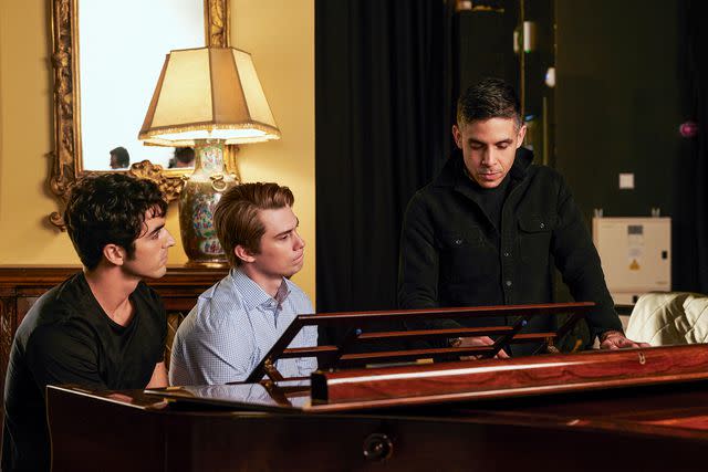 <p>Rob Youngson/Prime Video</p> Taylor Zakhar Perez, Nicholas Galitzine, and director Matthew Lopez on the set of 'Red, White & Royal Blue'