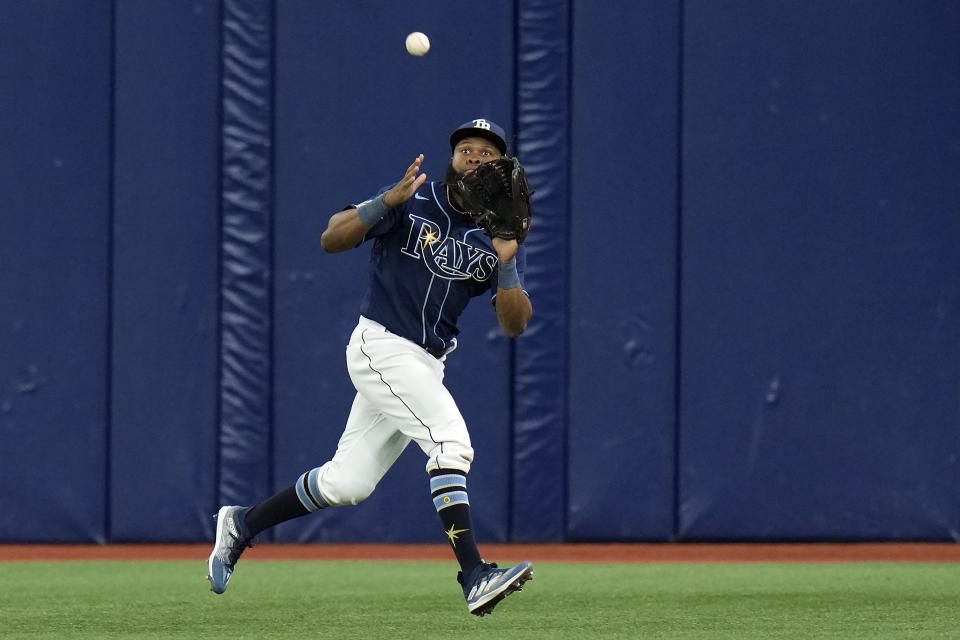 Tampa Bay Rays center fielder Manuel Margot makes the catch on a fly out Toronto Blue Jays' Matt Chapman during the eighth inning of a baseball game Thursday, May 25, 2023, in St. Petersburg, Fla. (AP Photo/Chris O'Meara)