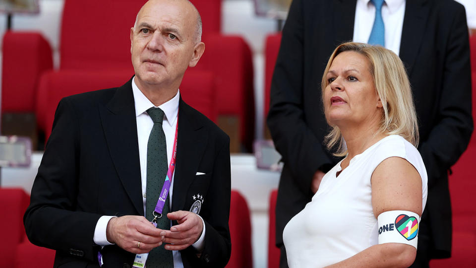 FIFA president Gianni Infantino is seen standing with German interior minister Nancy Faeser.