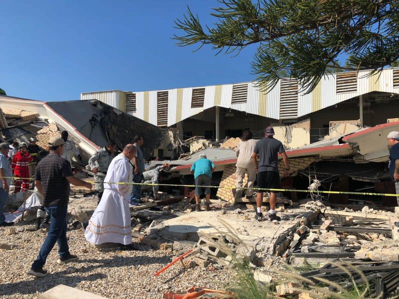 The roof of the Iglesia Santa Cruz Church in the city of Madero, Tamaulipas, collapsed Sunday afternoon, killing at least nine people. Photo courtesy of Secretary of Public Security Tamaulipas/Facebook