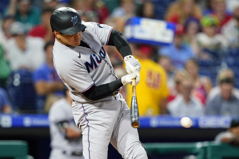 Miami Marlins' Avisail Garcia hits a run-scoring single against Philadelphia Phillies pitcher Kyle Gibson during the third inning of a baseball game, Thursday, Sept. 8, 2022, in Philadelphia. (AP Photo/Matt Slocum)