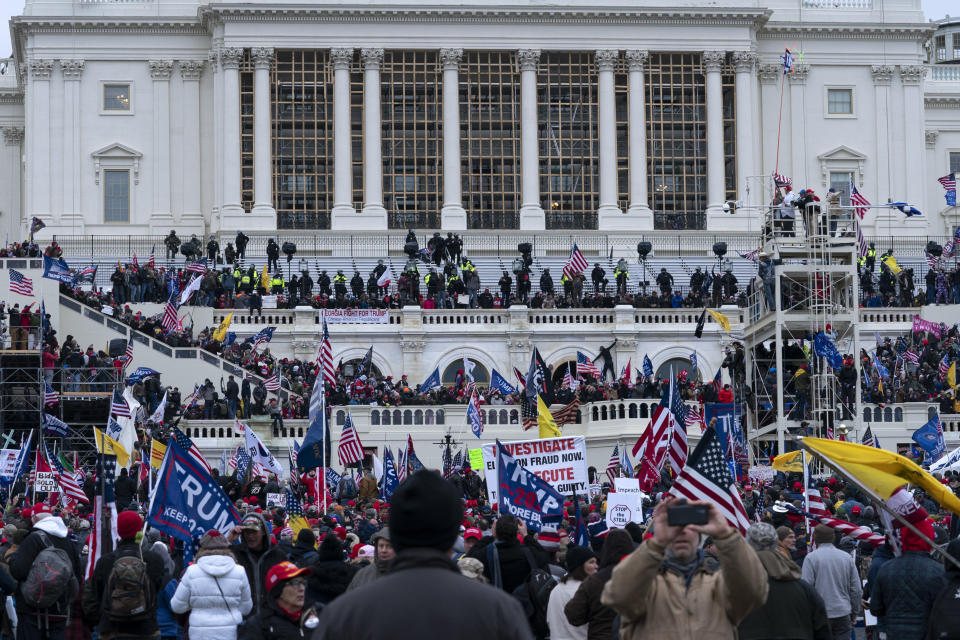 FILE - In this Jan. 6, 2021 file photo, violent insurrectionists loyal to President Donald Trump storm the U.S. Capitol in Washington. (AP Photo/Jose Luis Magana, File)