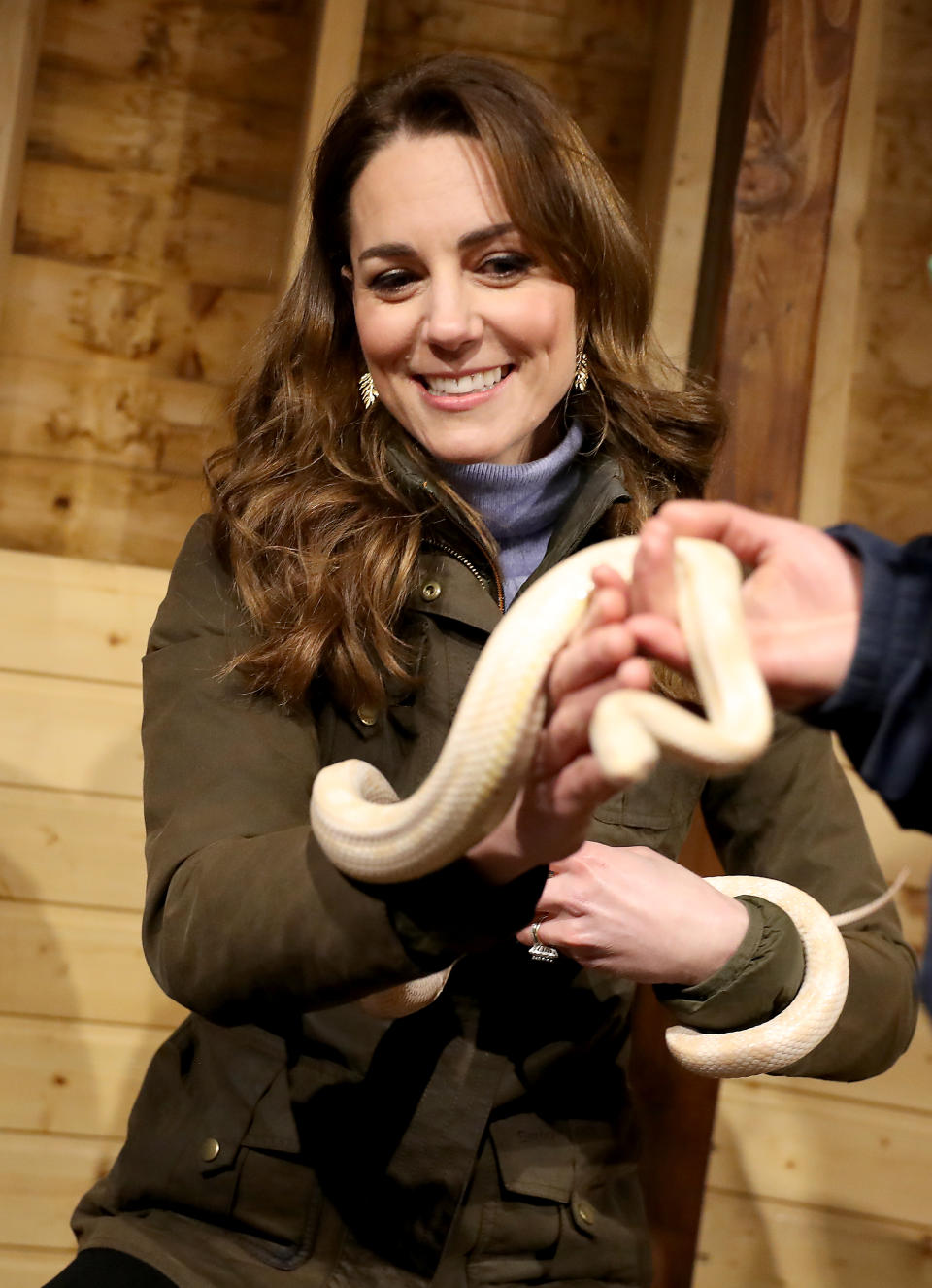 NEWTOWNARDS, NORTHERN IRELAND - FEBRUARY 12: Catherine, Duchess of Cambridge holds a snake as she visits The Ark Open Farm on February 12, 2020 in Newtownards, Northern Ireland. This visit is part of her Early Years Foundation Survey.  (Photo by Chris Jackson/Getty Images)