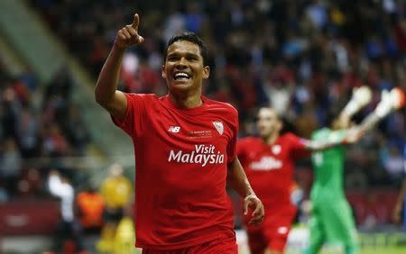 Dnipro Dnipropetrovsk v Sevilla - UEFA Europa League Final - National Stadium, Warsaw, Poland - 27/5/15. Carlos Bacca celebrates scoring the third goal for Sevilla Reuters / Kai Pfaffenbach