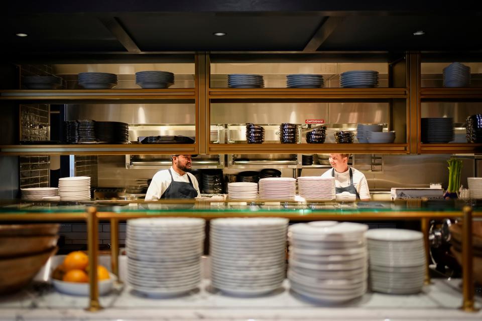 Aug 16, 2023; Columbus, Ohio, USA; The kitchen staff works inside Cento, a new Italian restaurant by Cameron Mitchell opening in German Village.