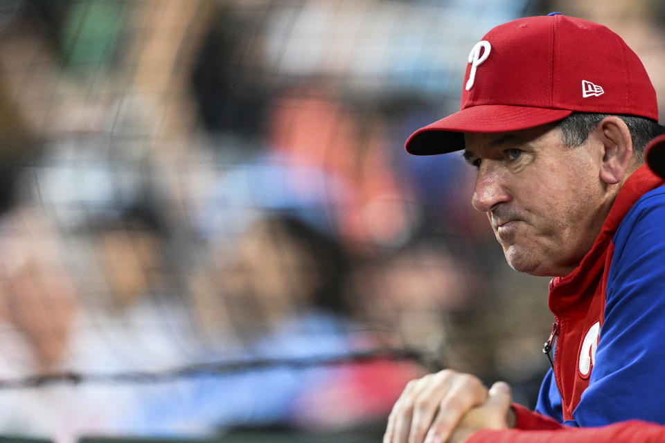 Philadelphia Phillies manager Rob Thomson looks on during the sixth inning of a baseball game against the Baltimore Orioles, Friday, June 14, 2024, in Baltimore. (AP Photo/Terrance Williams)