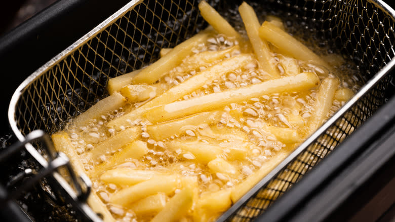 french fries in fryer